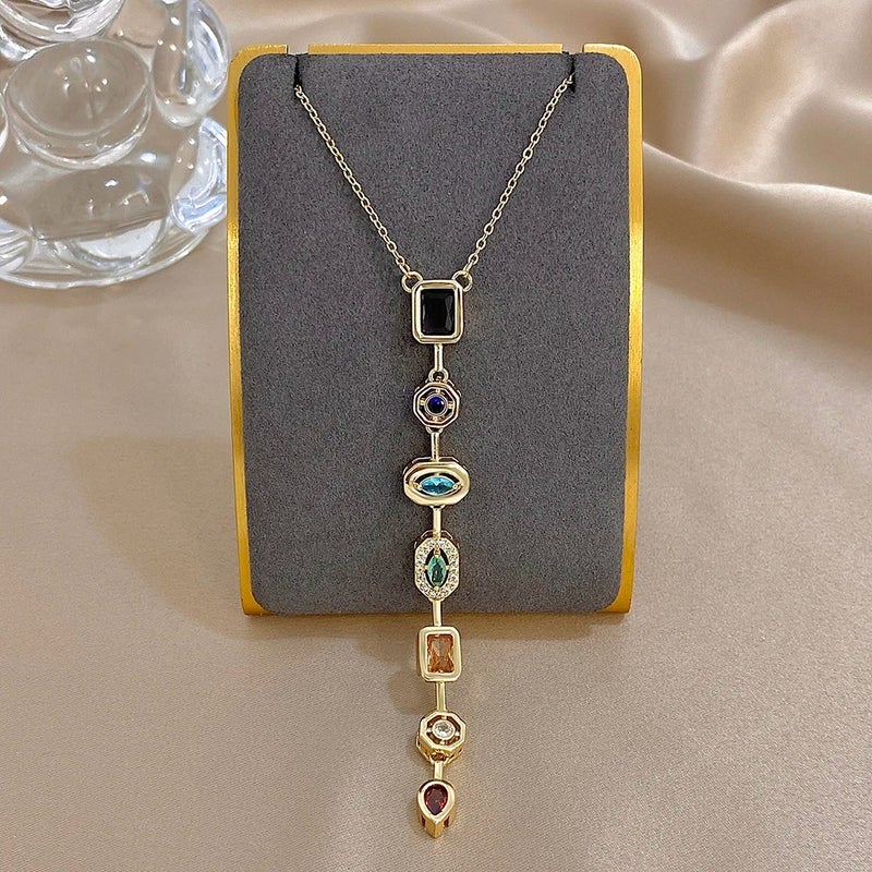 سلسلة أستانليس ستيل ذهبي مرصعة بفصوص الزيركون متعددة الألوان - Image 1