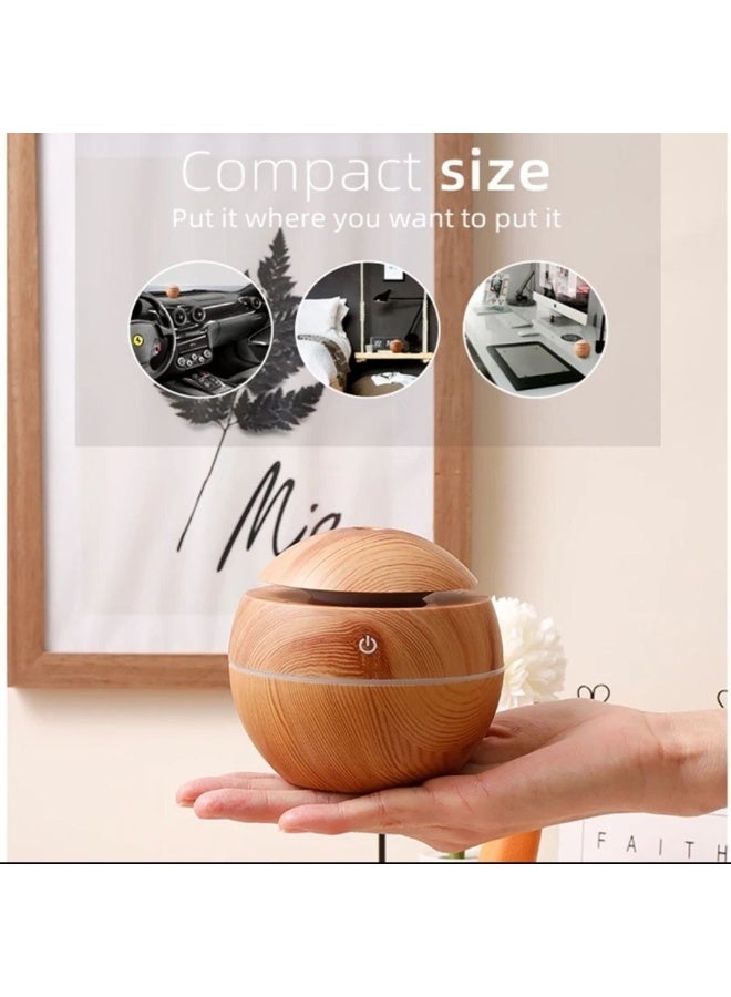 Globe-shaped wooden humidifier and nightlight with a 300ml capacity and 3W power. Features multi-color LED lighting and operates via a 5V USB connection. - Image 2