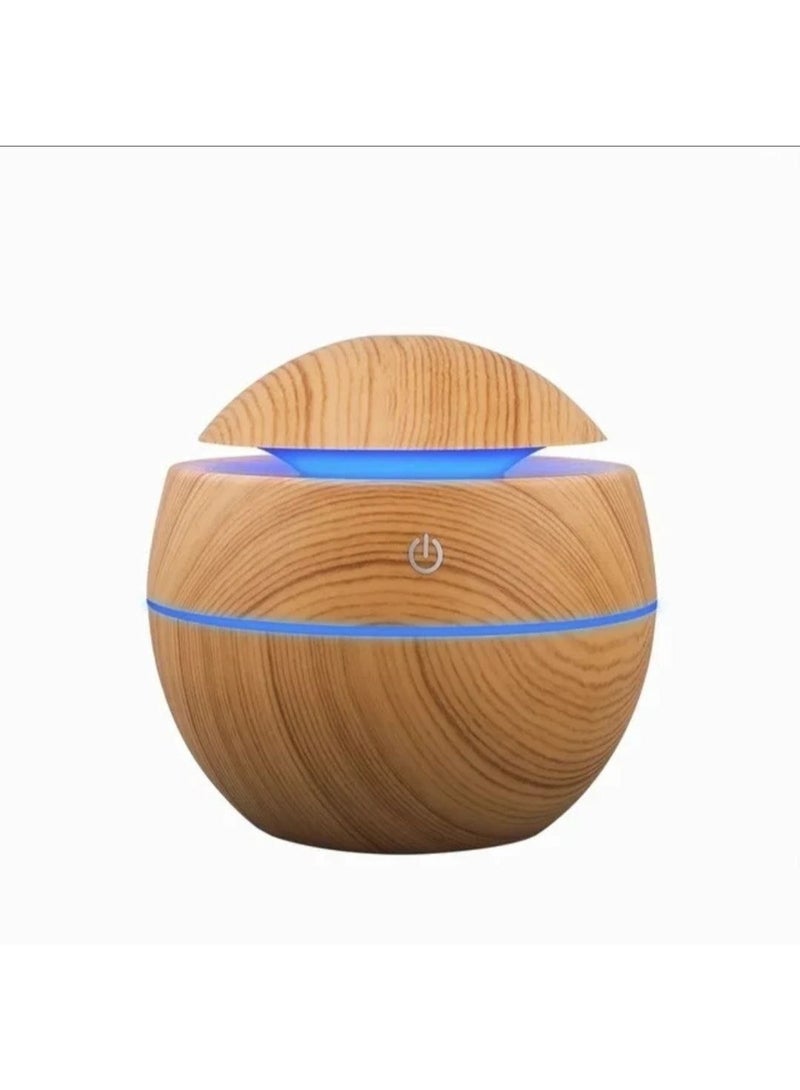 Globe-shaped wooden humidifier and nightlight with a 300ml capacity and 3W power. Features multi-color LED lighting and operates via a 5V USB connection. - Image 1