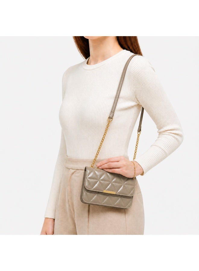 Women's padded shoulder bag with a stylish crossbody design – luxurious leather with a gold chain and metal clasp - Image 1