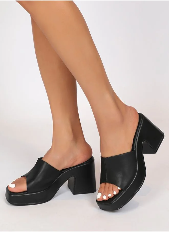 Sneak-a-Peek Solid Block Heel Sandals by Styli