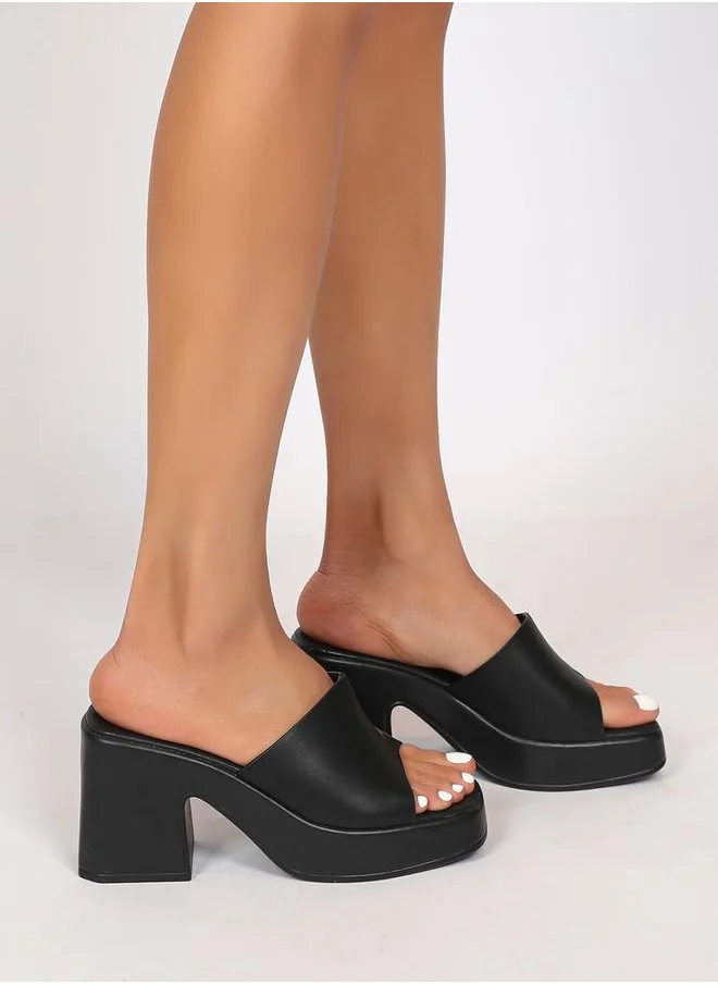 Sneak-a-Peek Solid Block Heel Sandals by Styli