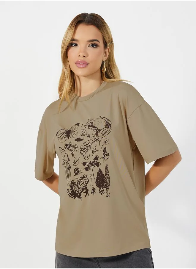 Styli Oversized Graphic Print Round Neck T-shirt