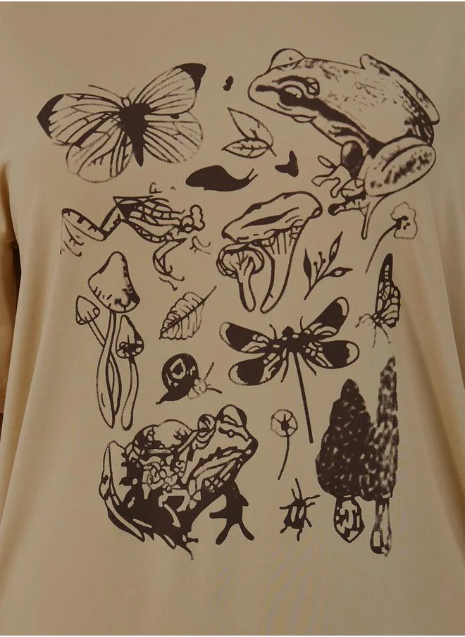 Styli Oversized Graphic Print Round Neck T-shirt