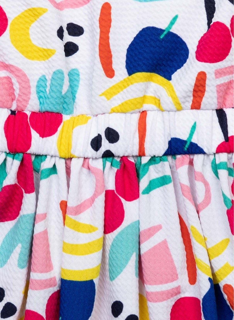 مينوتي فستان قطن بناتي أطفال بطبعة زاهية وحمالات متقاطعة - Image 3
