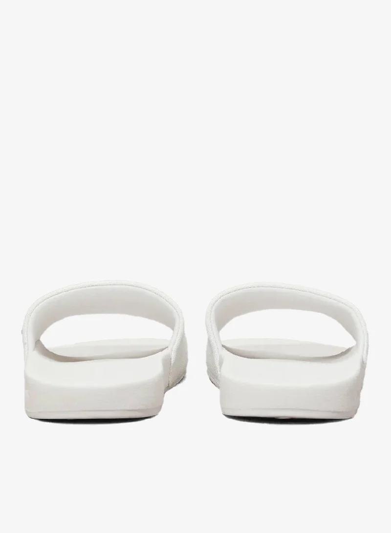 Calvin Klein Jeans Bright White/Black Canvas Sliders for Women | Best Price UAE