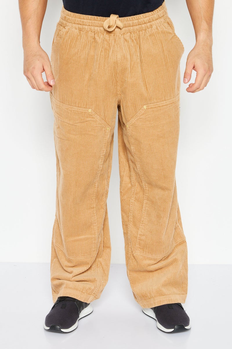 PUMA Men Sportswear Fit Training Sweatpants, Tan  - Image 1