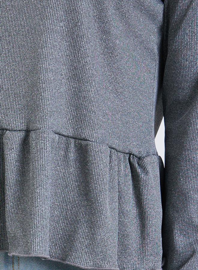 ستايلي تيشيرت بأكمام طويلة وتفاصيل حافة بيبلوم - Image 3