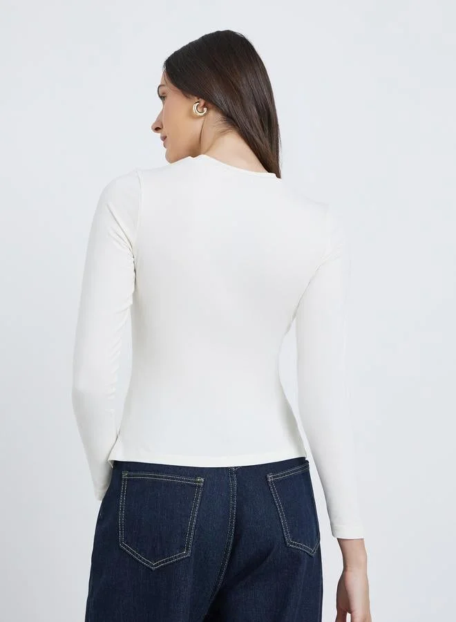 Styli  Styli Asymmetric Hem Button Detail Long Sleeve Top for Women | Best Price UAE