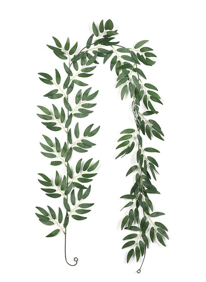 صُنعت هذه القطعة الزخرفية من أغصان صناعية فاخرة، وتتميز بتصميم كلاسيكي أنيق. حتى في المناخات الجافة، تحافظ أوراقها المقاومة للبهتان على لونها الأخضر الزاهي، مما يجعلها متينة وسهلة الصيانة، لتضفي جمال الطبيعة الخالد على منزلك. - Image 4