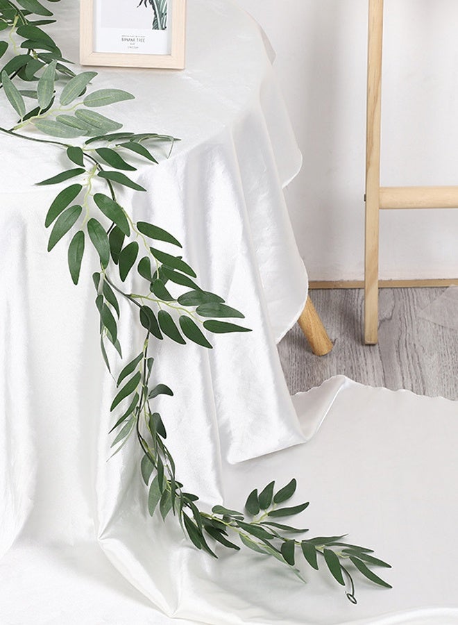 صُنعت هذه القطعة الزخرفية من أغصان صناعية فاخرة، وتتميز بتصميم كلاسيكي أنيق. حتى في المناخات الجافة، تحافظ أوراقها المقاومة للبهتان على لونها الأخضر الزاهي، مما يجعلها متينة وسهلة الصيانة، لتضفي جمال الطبيعة الخالد على منزلك. - Image 2