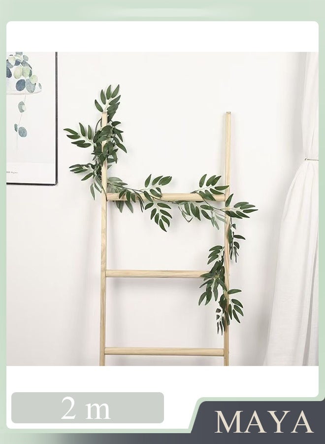 صُنعت هذه القطعة الزخرفية من أغصان صناعية فاخرة، وتتميز بتصميم كلاسيكي أنيق. حتى في المناخات الجافة، تحافظ أوراقها المقاومة للبهتان على لونها الأخضر الزاهي، مما يجعلها متينة وسهلة الصيانة، لتضفي جمال الطبيعة الخالد على منزلك. - Image 1