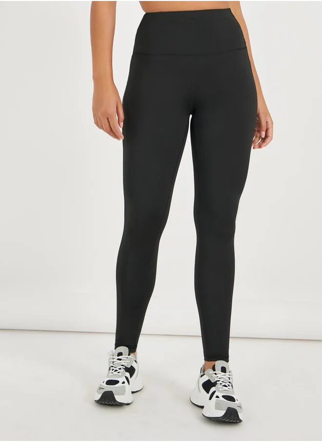 Styli V Shaped Back Waist Stitch Leggings with Reflective Detail