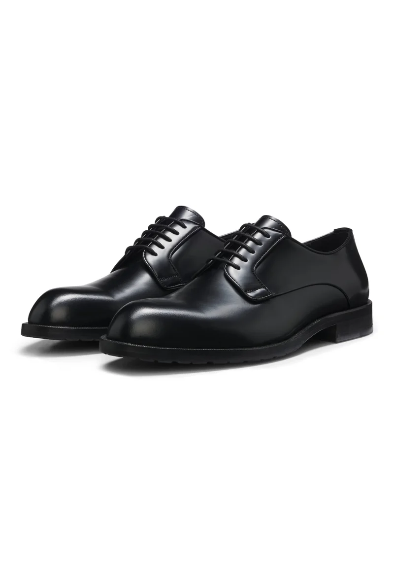 Derby shoes in brush-off leather with embossed logo