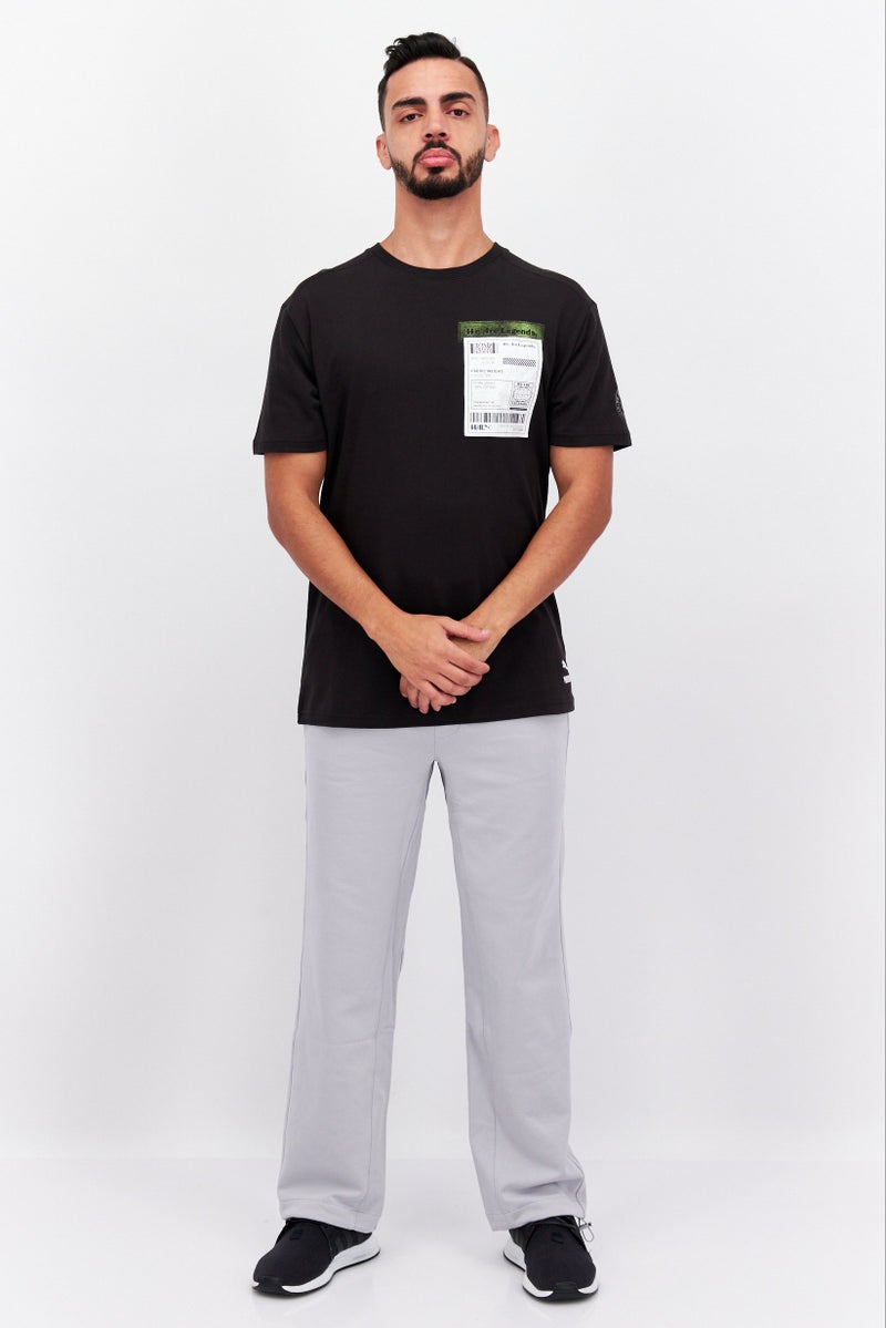 PUMA Men Relaxed Fit Outdoor Short Sleeve T-Shirt, Black - Image 2