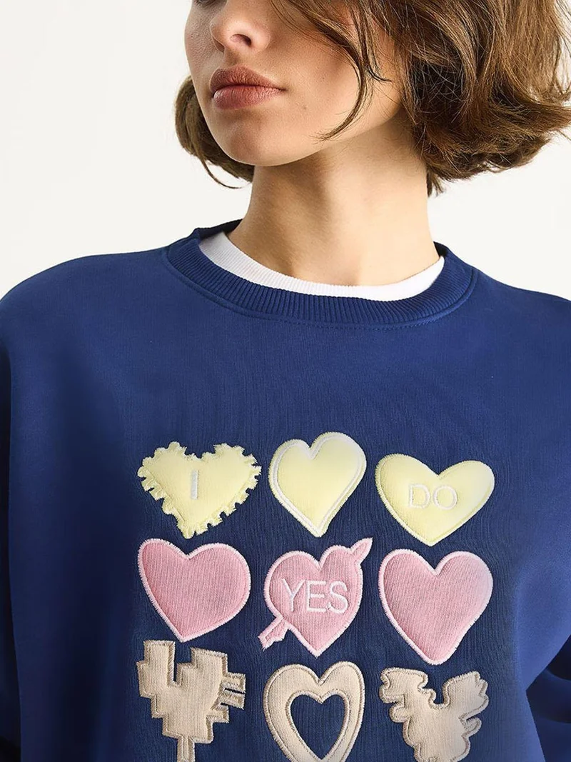 Bianco Lucci Heart Patch Appliqué Relaxed Fit Crew Neck Sweatshirt