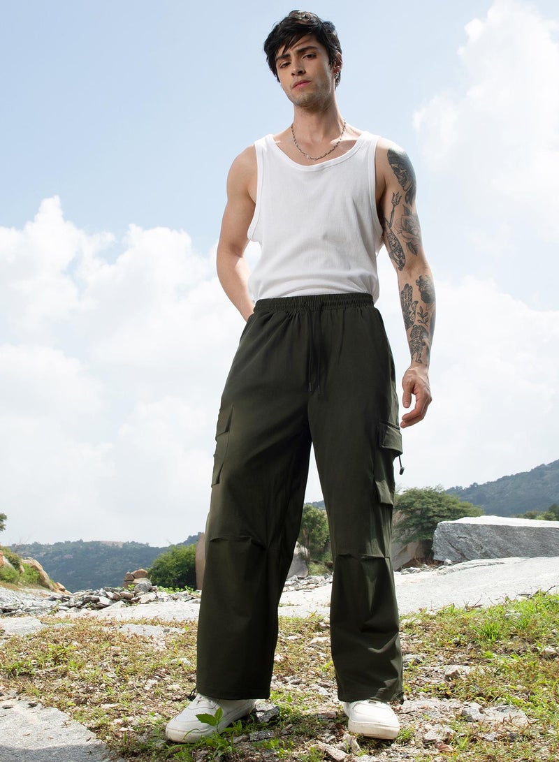 Campus Sutra Campus Sutra Men's Army Green Solid Cargo Parachute Trousers For Casual Wear | Relaxed Fit | Low-Rise | Button Closure | Cargo Pants Crafted With Comfort Fit For Everyday Wear - Image 5