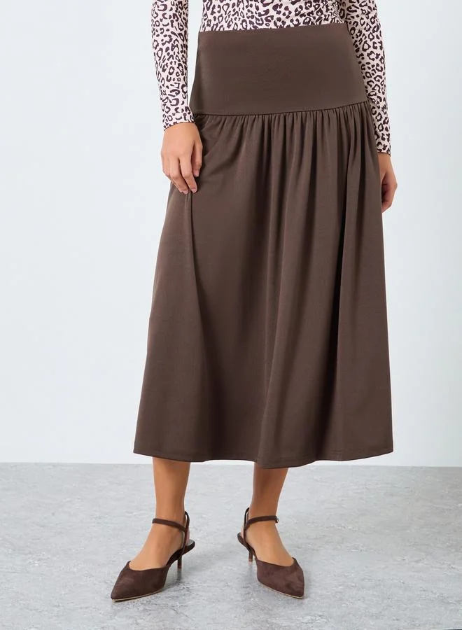 ستايلي تنورة ميدي بحافة واسعة وخصر منخفض