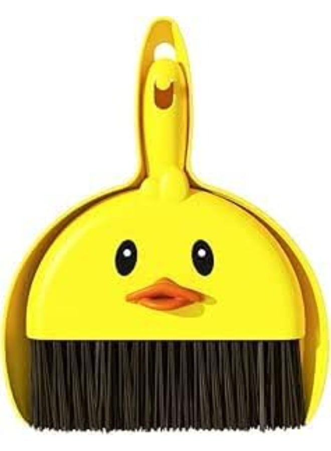 A small, portable, handheld, space-saving broom and dustpan set for cleaning