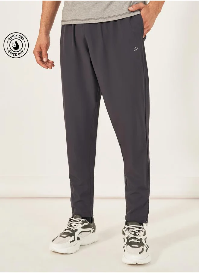 Styli Woven Running Track Pants with Zip Hem