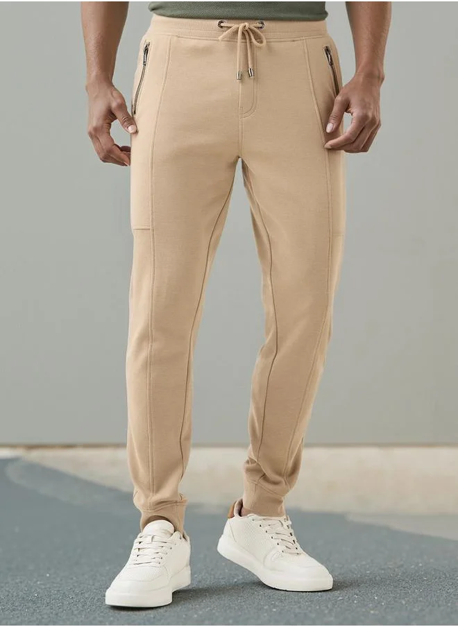 ايكونيك Iconic Slim Fit Joggers with Drawstring Closure and Pockets