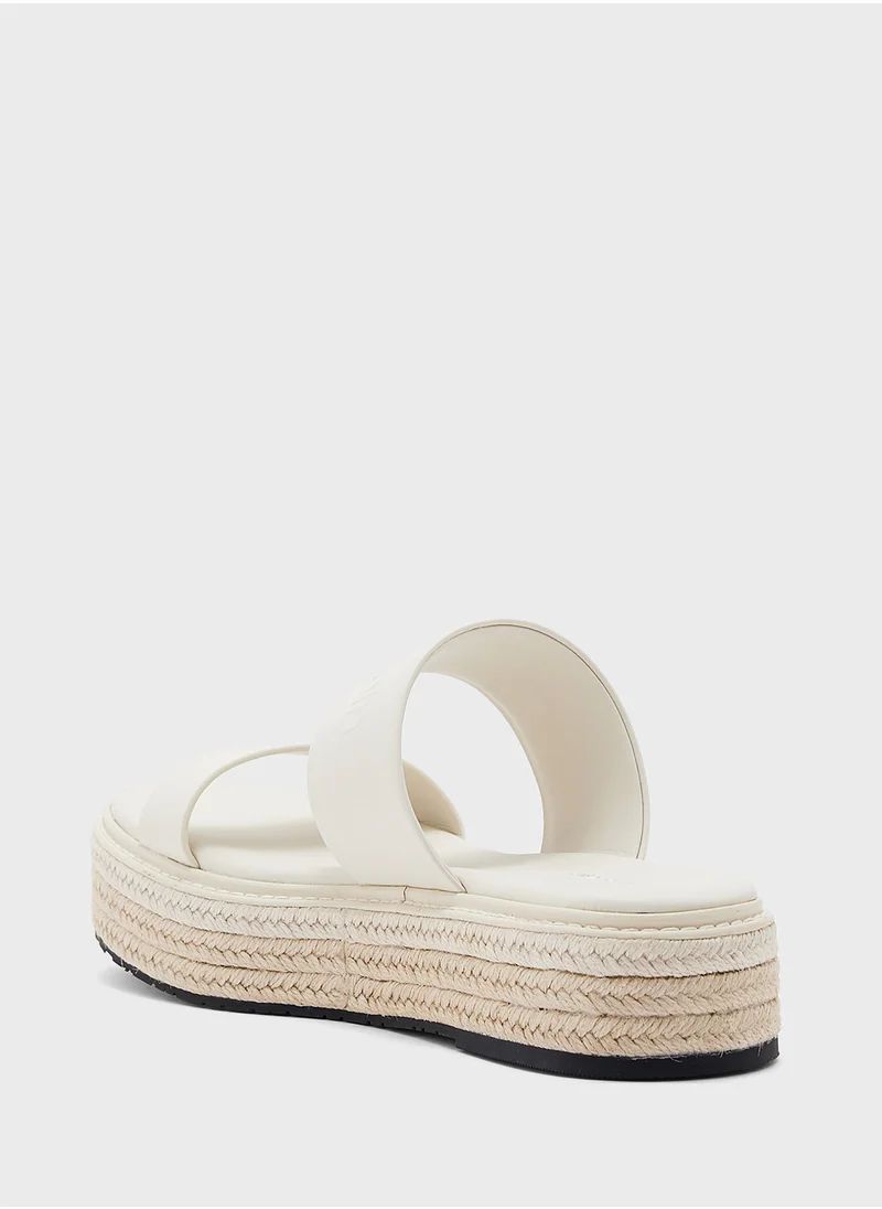 CALVIN KLEIN FLATFORM WEDGE SLIDES