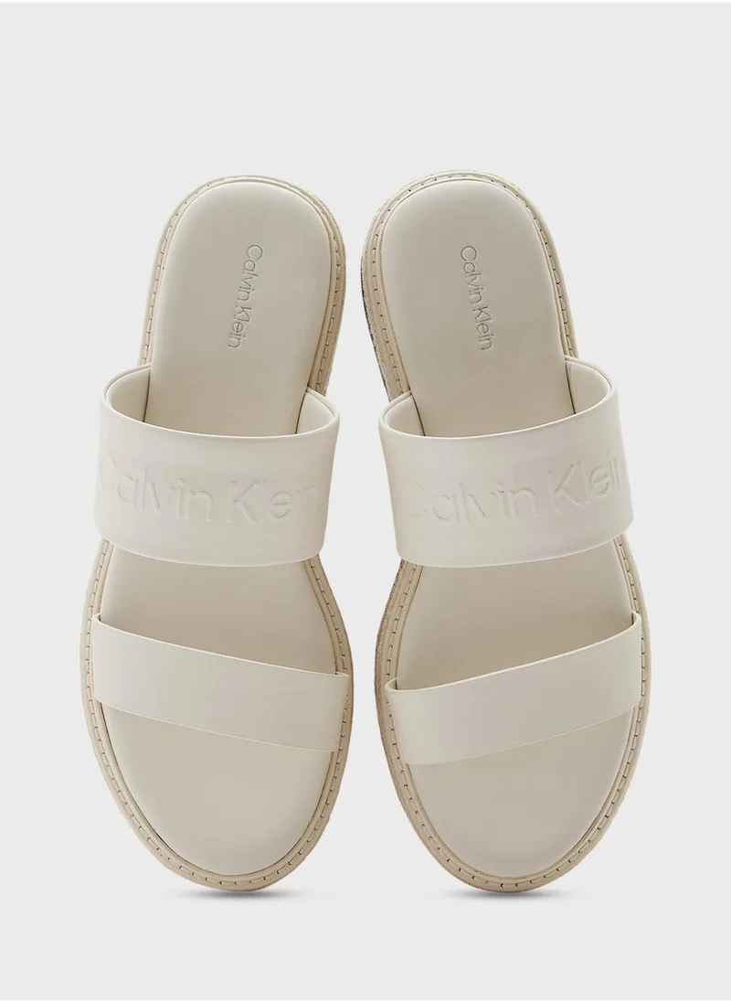 CALVIN KLEIN FLATFORM WEDGE SLIDES