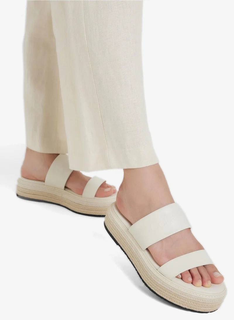 CALVIN KLEIN FLATFORM WEDGE SLIDES