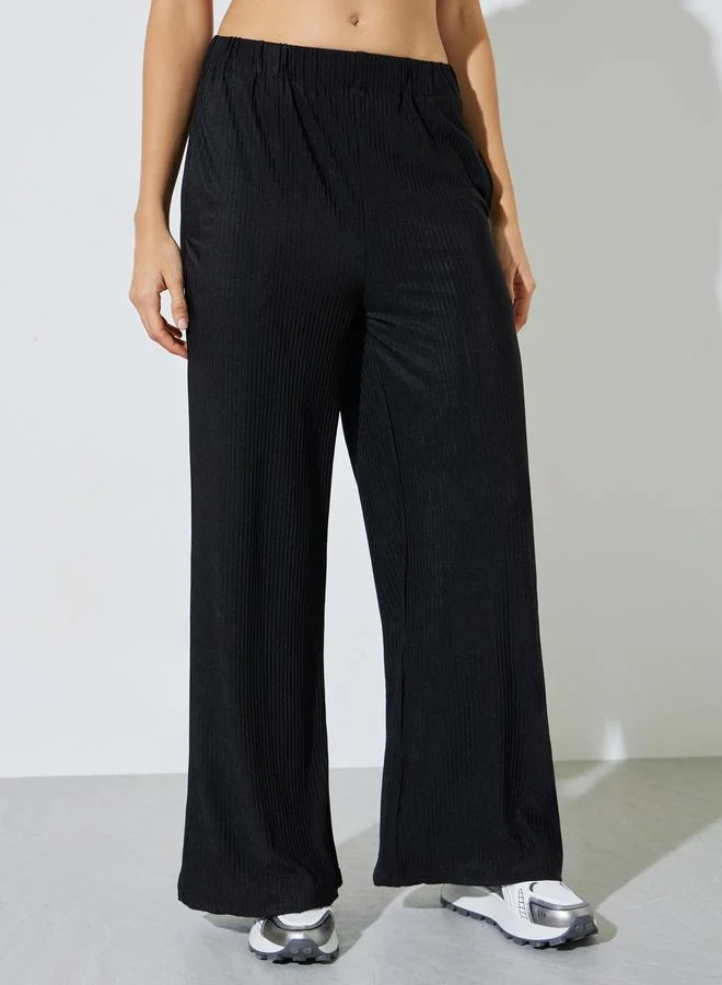 ستايلي Black Plisse Wide Leg Pants