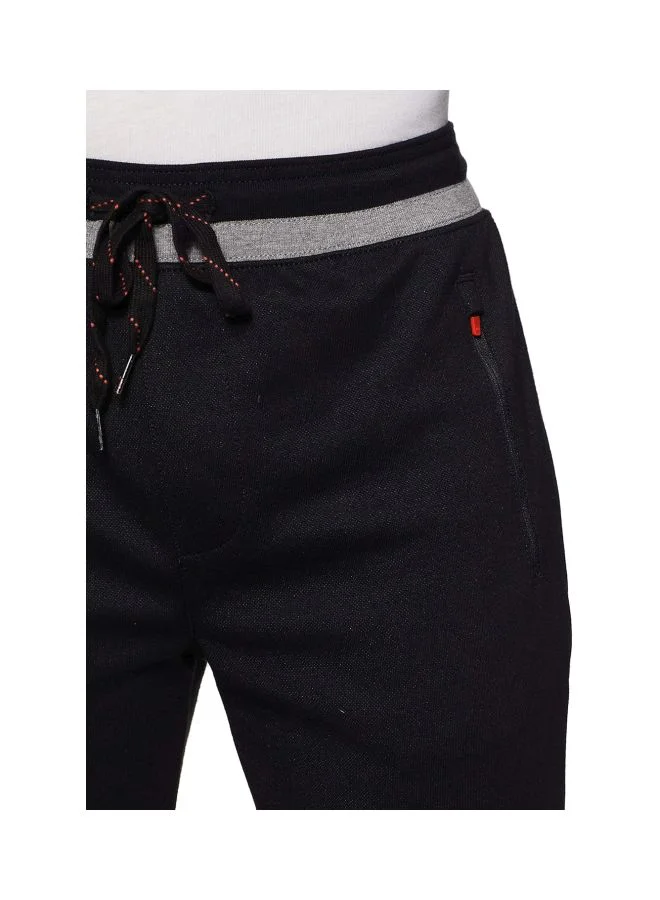 Jockey black AM05 Men Super Combed Cotton Rich Pique Fabric Slim Fit Joggers with Zipper Pockets for Men | Best Price UAE