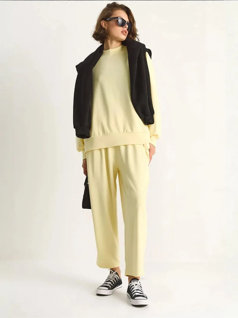 بيانكو لوتشي طقم من قطعتين محبوك بياقة دائرية وأكمام طويلة