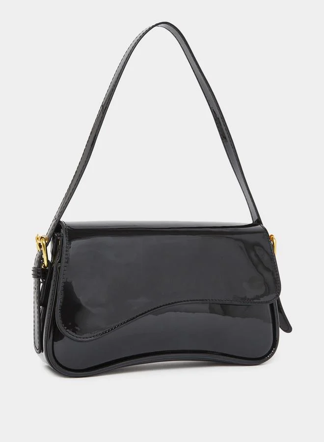 ستايلي شنطة باجيت بتفاصيل براقة