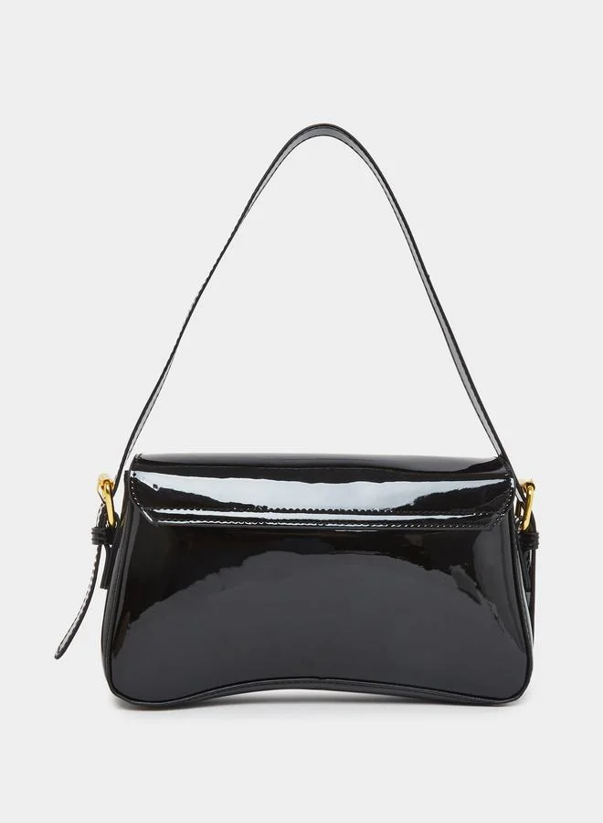 ستايلي شنطة باجيت بتفاصيل براقة