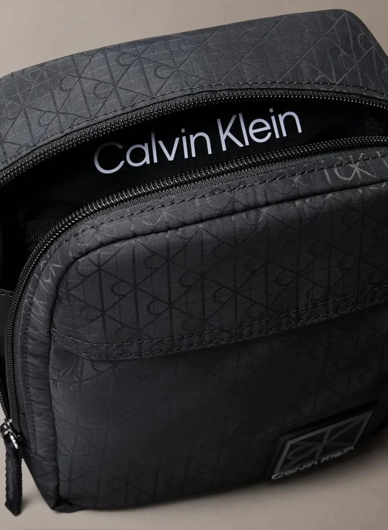 Calvin Klein Black Allover Emblem Logo Jacquard Reporter Bag for Men | Best Price UAE
