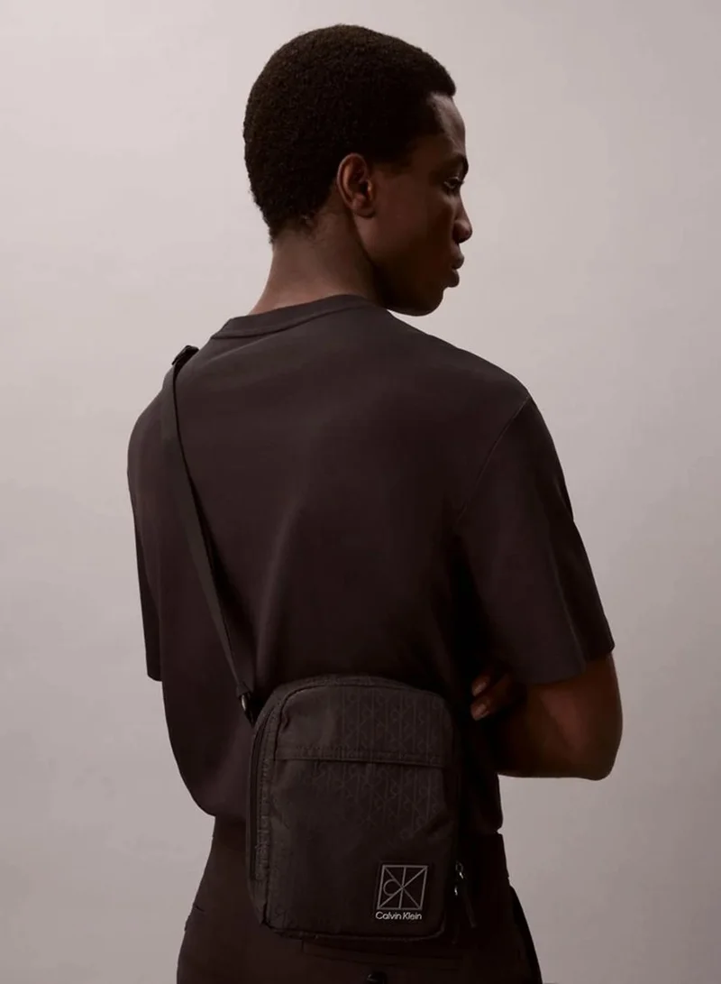 Calvin Klein Black Allover Emblem Logo Jacquard Reporter Bag for Men | Best Price UAE
