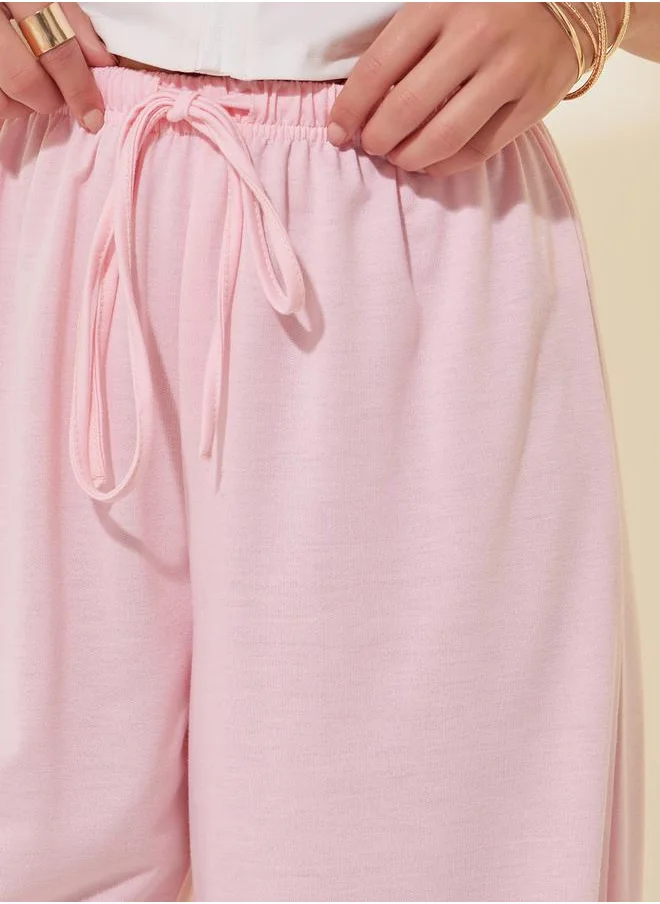 Styli Solid Mid Rise Relaxed Fit Pants with Drawstring
