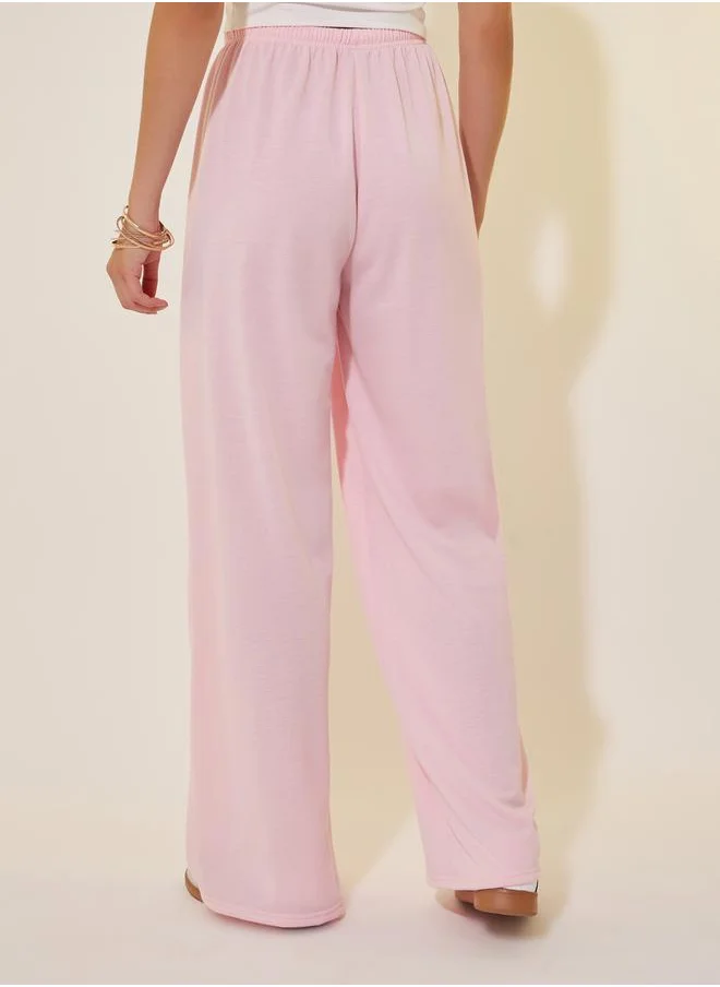 Styli Solid Mid Rise Relaxed Fit Pants with Drawstring