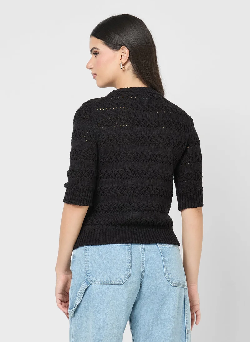 جينجر كنزة محبوكة بنقشة بارزة بقصة ضيقة