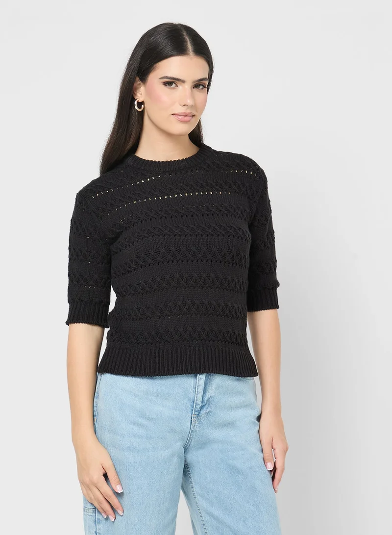 جينجر كنزة محبوكة بنقشة بارزة بقصة ضيقة