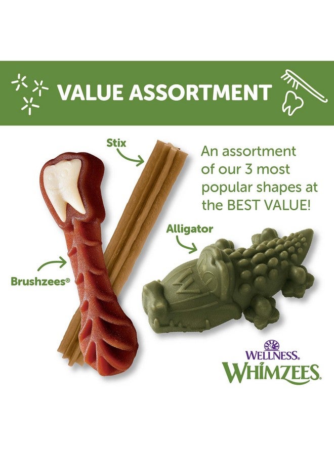 ويمزيس علبة قيمة من علكات الكلاب طويلة الأمد من Wellness: مكافآت طبيعية خالية من الحبوب للمساعدة في تنظيف الأسنان وتقليل البلاك والجير - للكلاب التي يتراوح وزنها بين 40 و60 رطلاً - 24 قطعة - Image 4