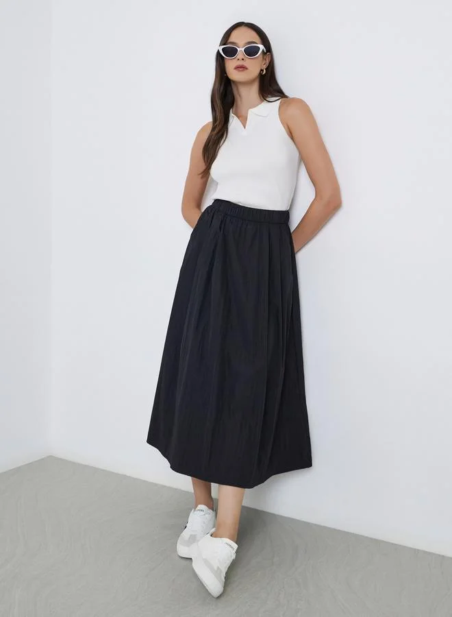 Styli Elastic Waistband A-Line Maxi Skirt