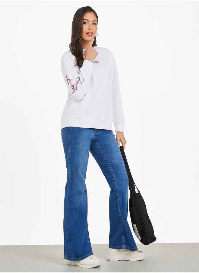 Styli - Regular Fit Slogan Print Sweatshirt - Image 1
