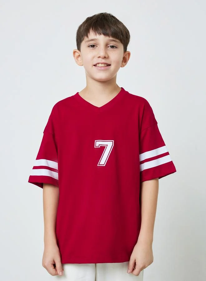 Styli Teen Boys Red V-Neck Varsity Stripes Sleeves Oversized T-Shirt