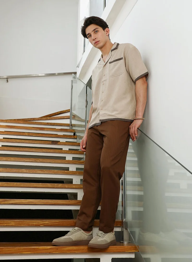 Campus Sutra Men's Beige Cuban Collar Shirt with Dark Brown Accents