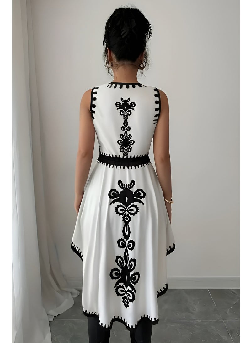 شارلي فستان نسائي مطرز بدون أكمام - مقاس M - أبيض وأسود - حاشية غير متماثلة - فستان صيفي أنيق مستوحى من طراز بوهو للارتداء غير الرسمي والحفلات والمنتجعات - قماش خفيف الوزن قابل للتهوية - تفاصيل نمط شعبي أنيق - ملابس مريحة وأنيقة للنساء - أسلوب عرقي عصري - Image 4