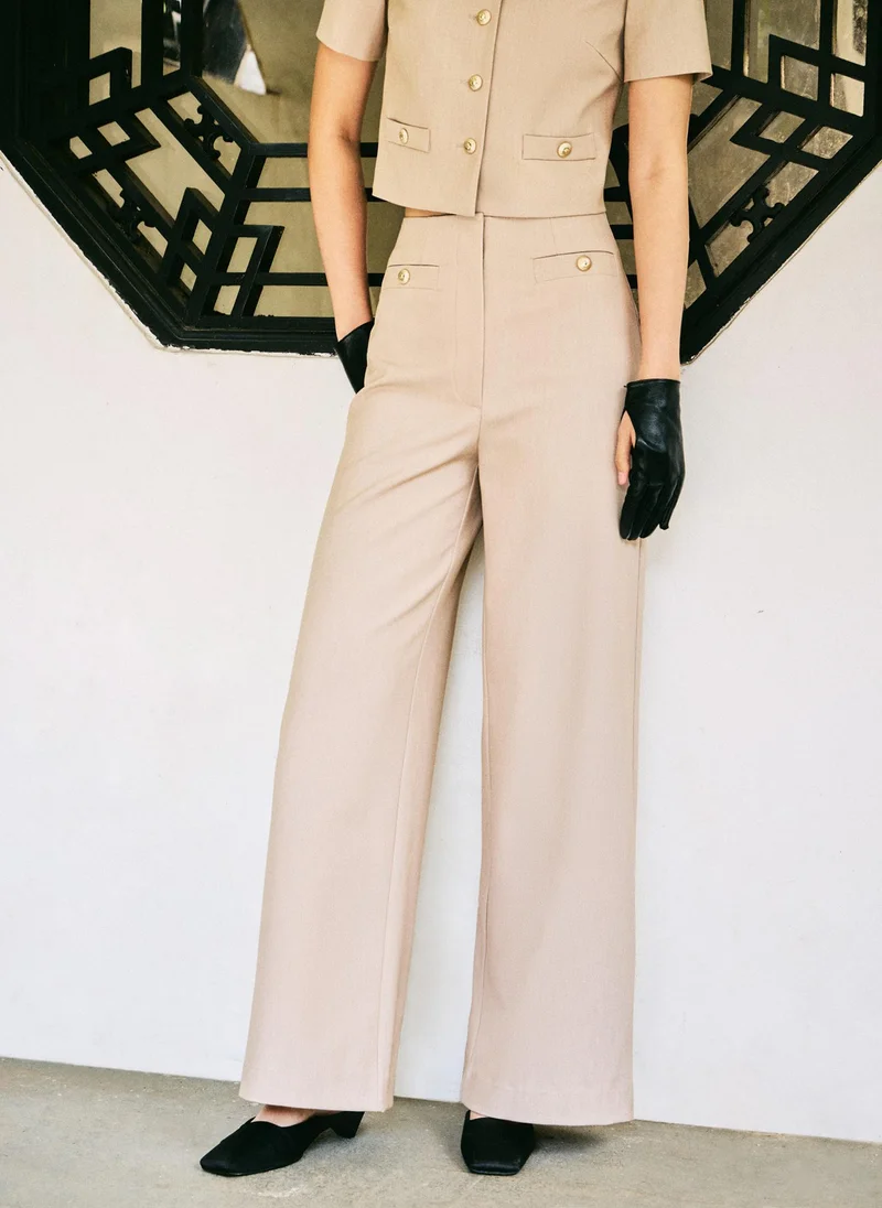 Lichi Mid-rise trousers with front creases and oversized buttons