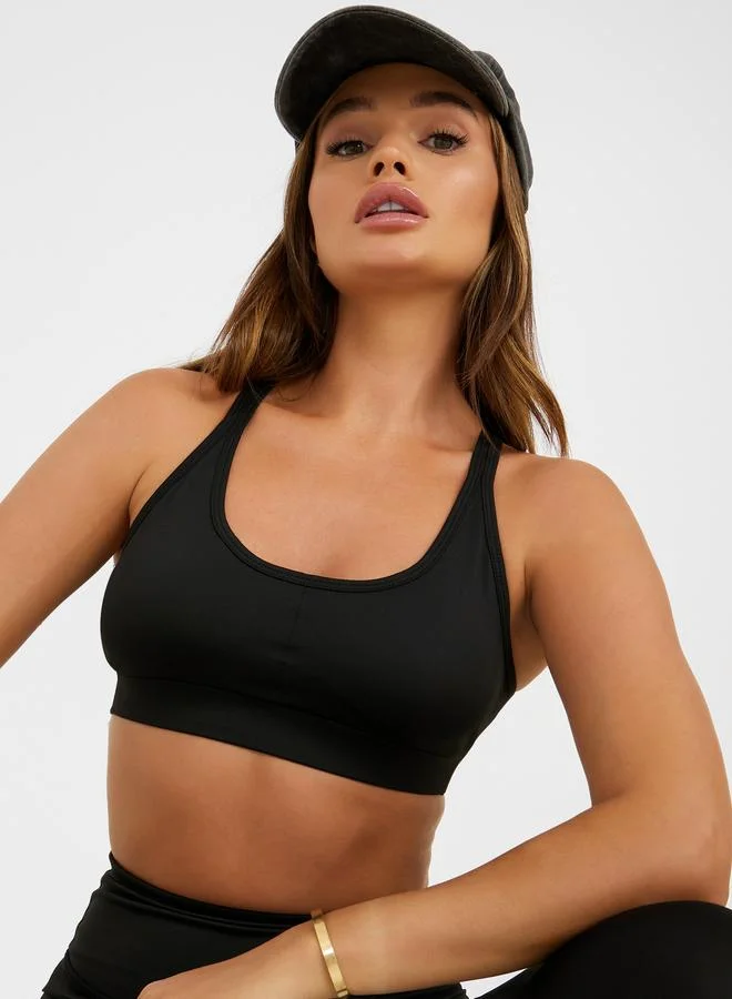 Styli Styli Pack of 3 - Melange Open Twist Back Top- Racerback Sports Bra and Leggings