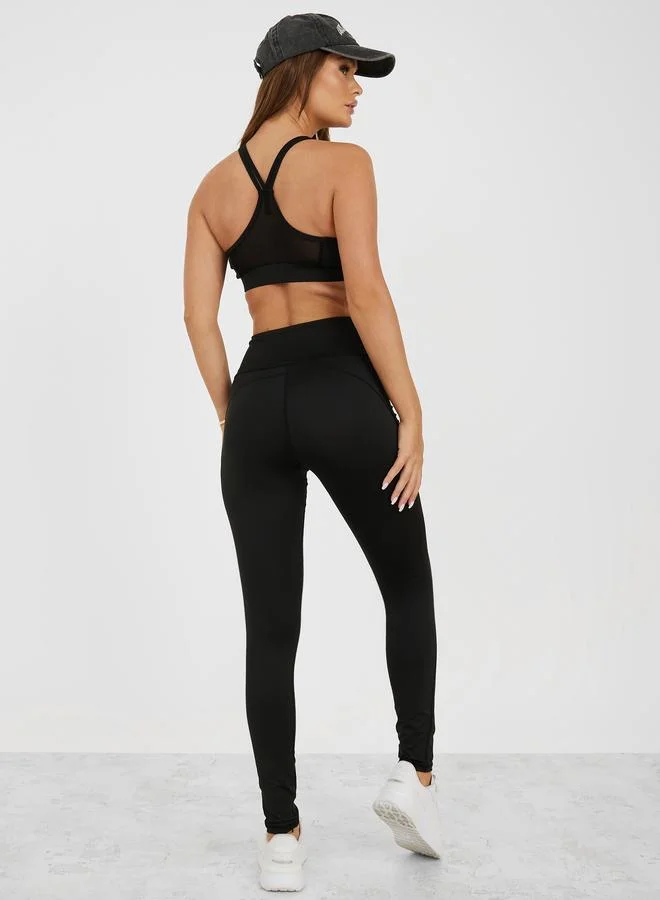 Styli Styli Pack of 3 - Melange Open Twist Back Top- Racerback Sports Bra and Leggings
