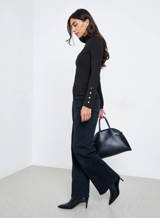 ستايلي بلوزة محبوكة بأكمام طويلة