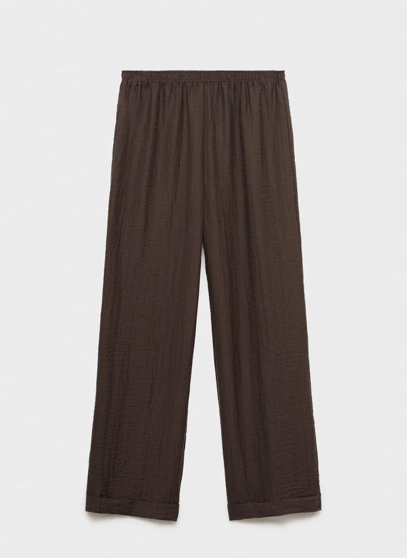 MANGO Lyocell trousers with elastic waistband